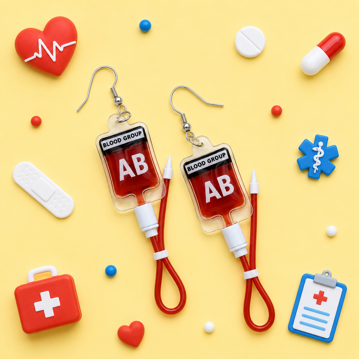 Mini blood bag earrings with realistic red liquid detail
